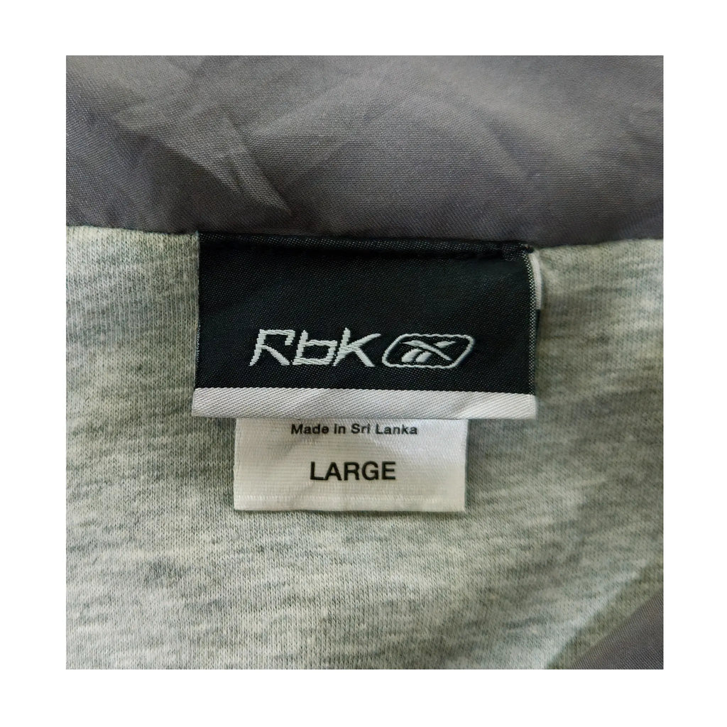 Vintage 2000-talls Reebok «RBK» tidsepoke treningsjakke
